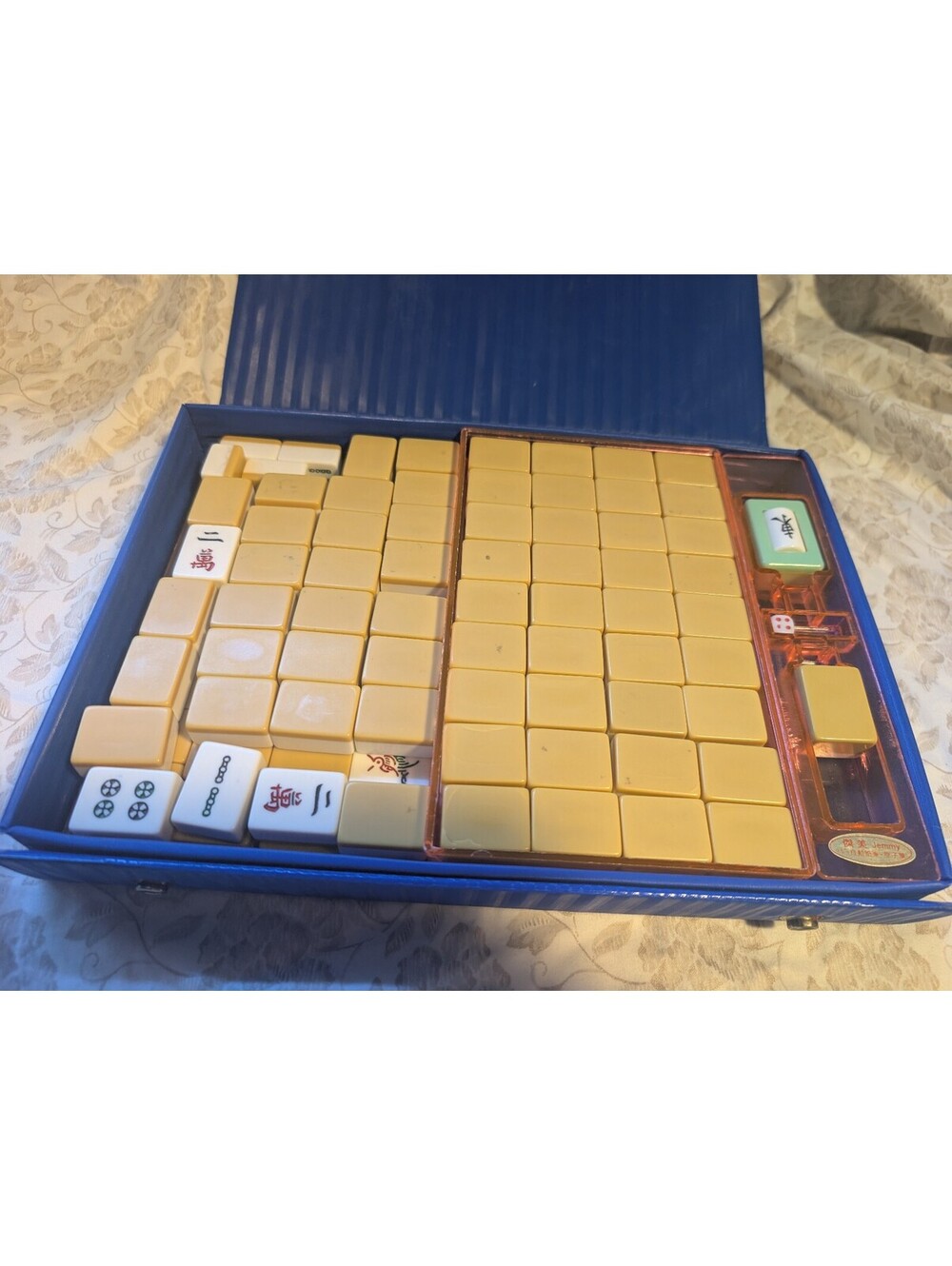 Vintage Mahjong Set with Yellow Tiles and Blue Carrying Case